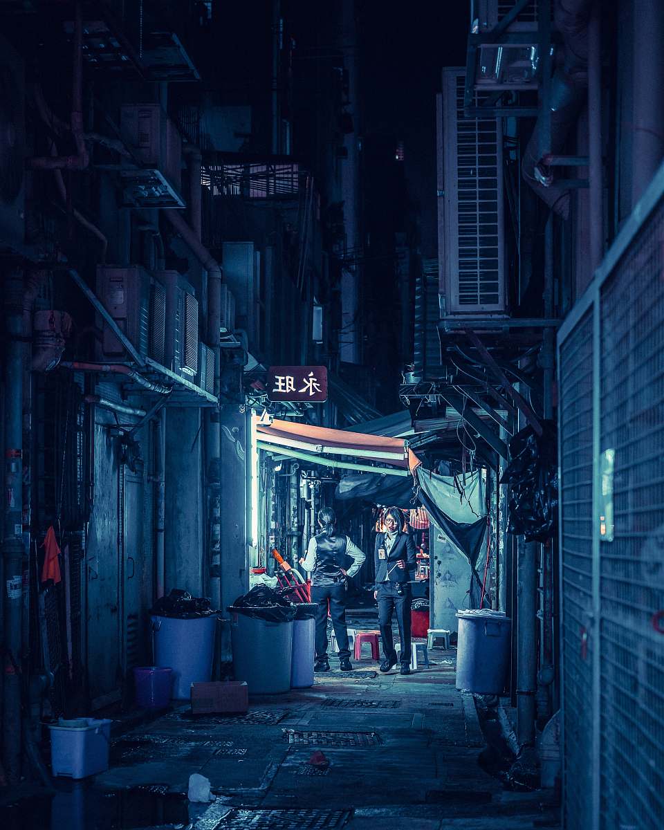 Street Landscape Photography Of Two Persons Standing Beside Trash Can ...