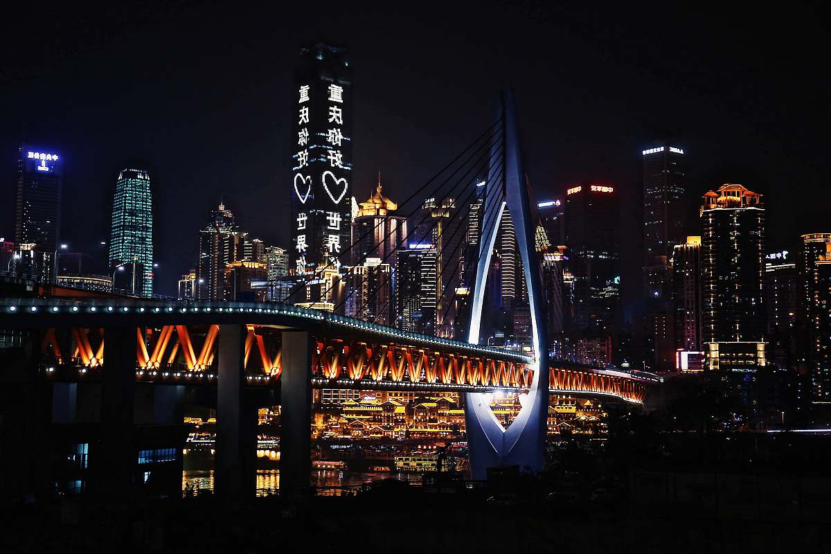 building lighted bridge metropolis