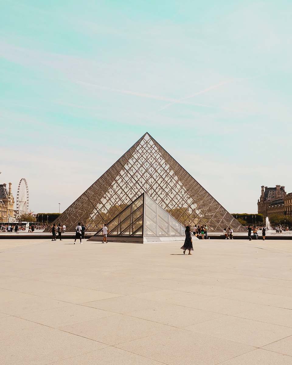 building Louvre Pyramid at daytime town