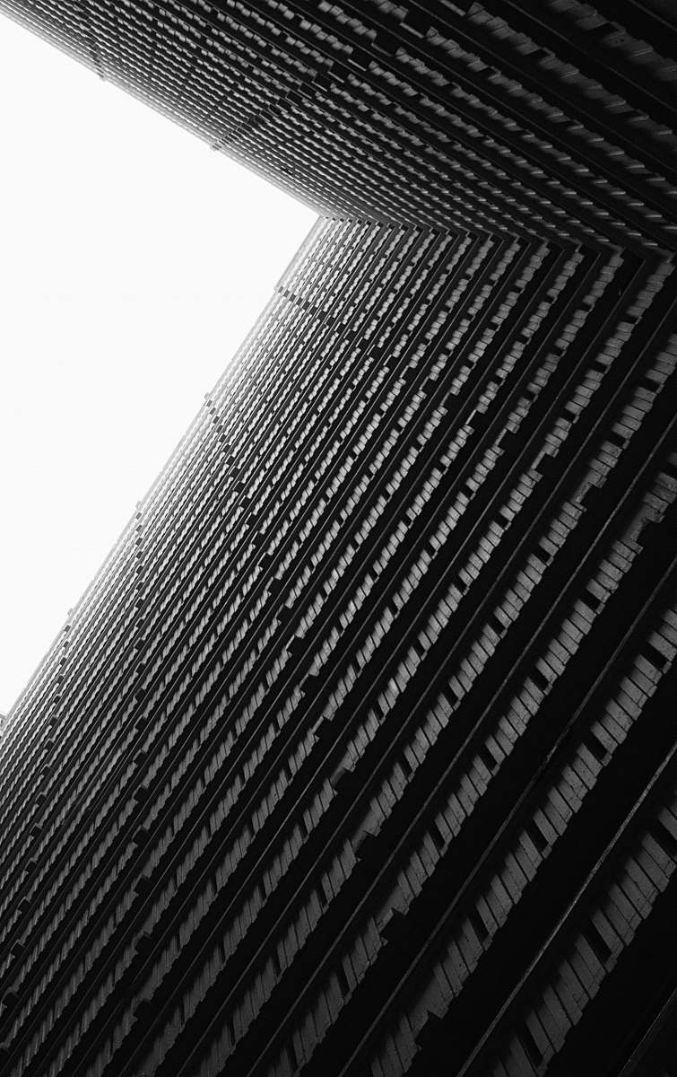 building low-angle grayscale photography of high-rise building black-and-white