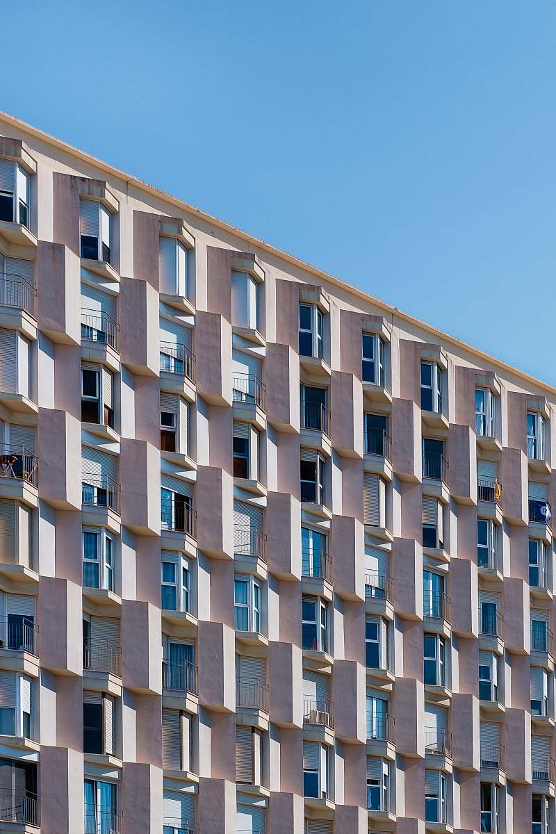 urban low angle photo of gray concrete building building