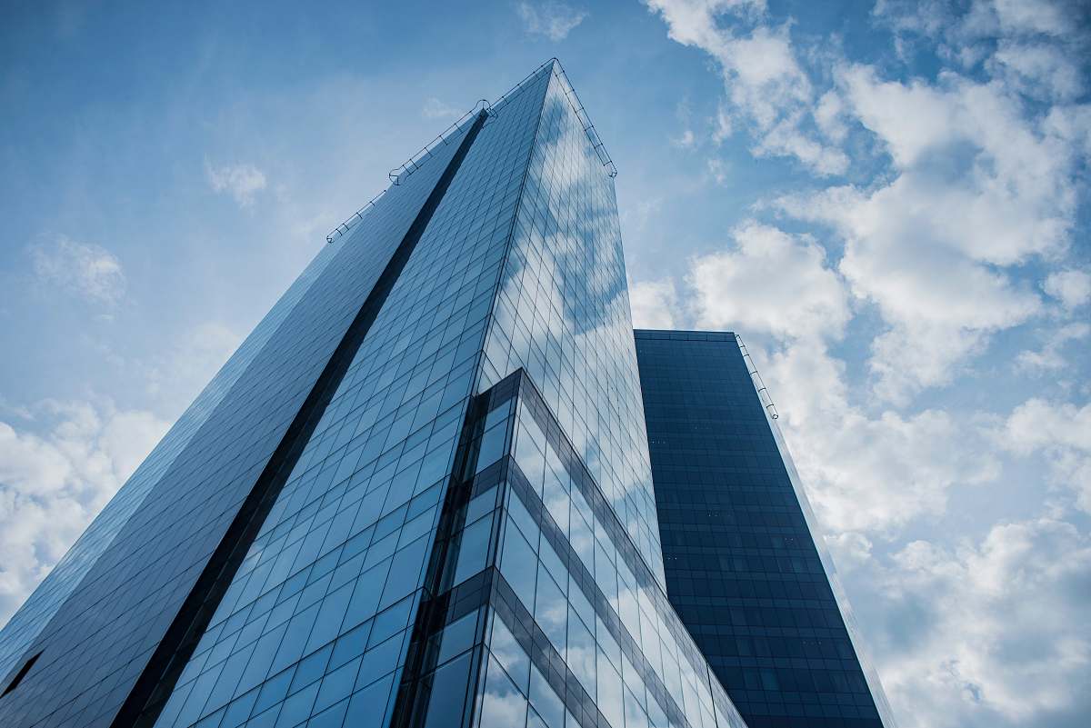 building low angle photo of high-rise building architecture
