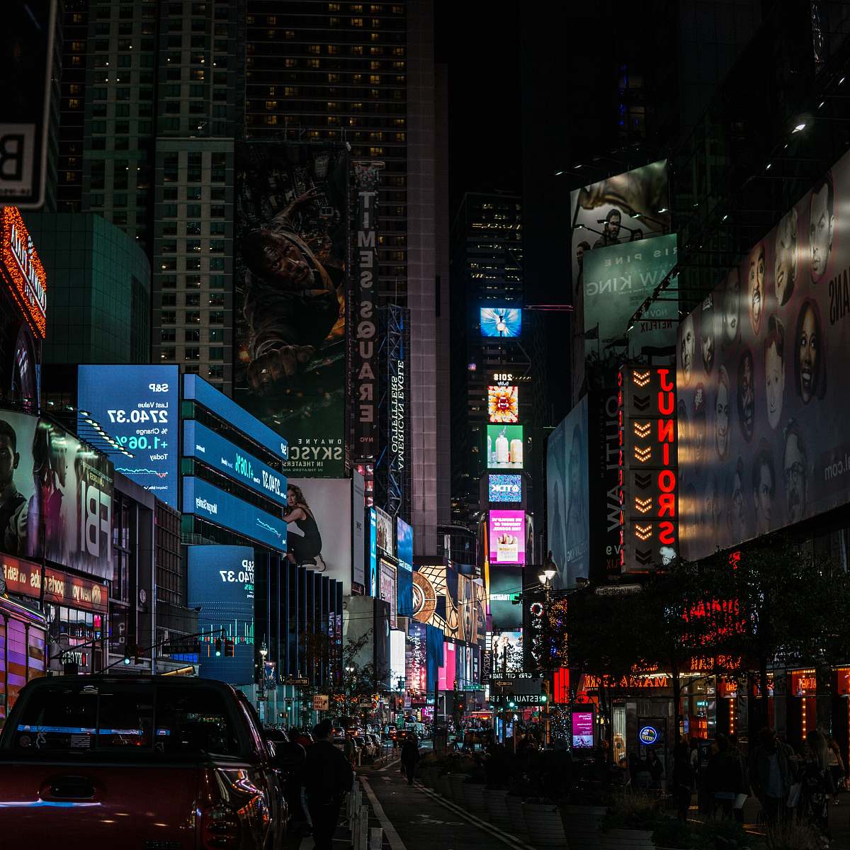 building low angle photo of lighted buildings metropolis