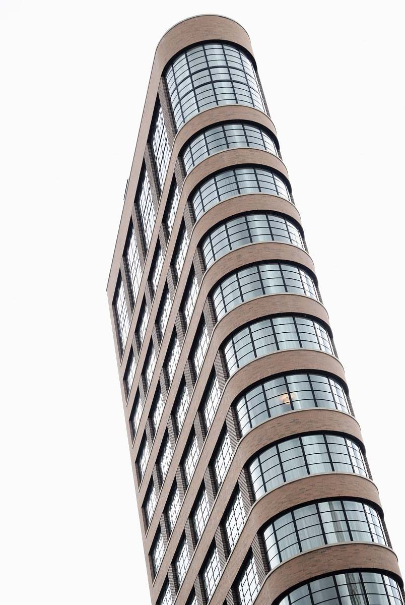 building low angle photography of brown concrete building architecture