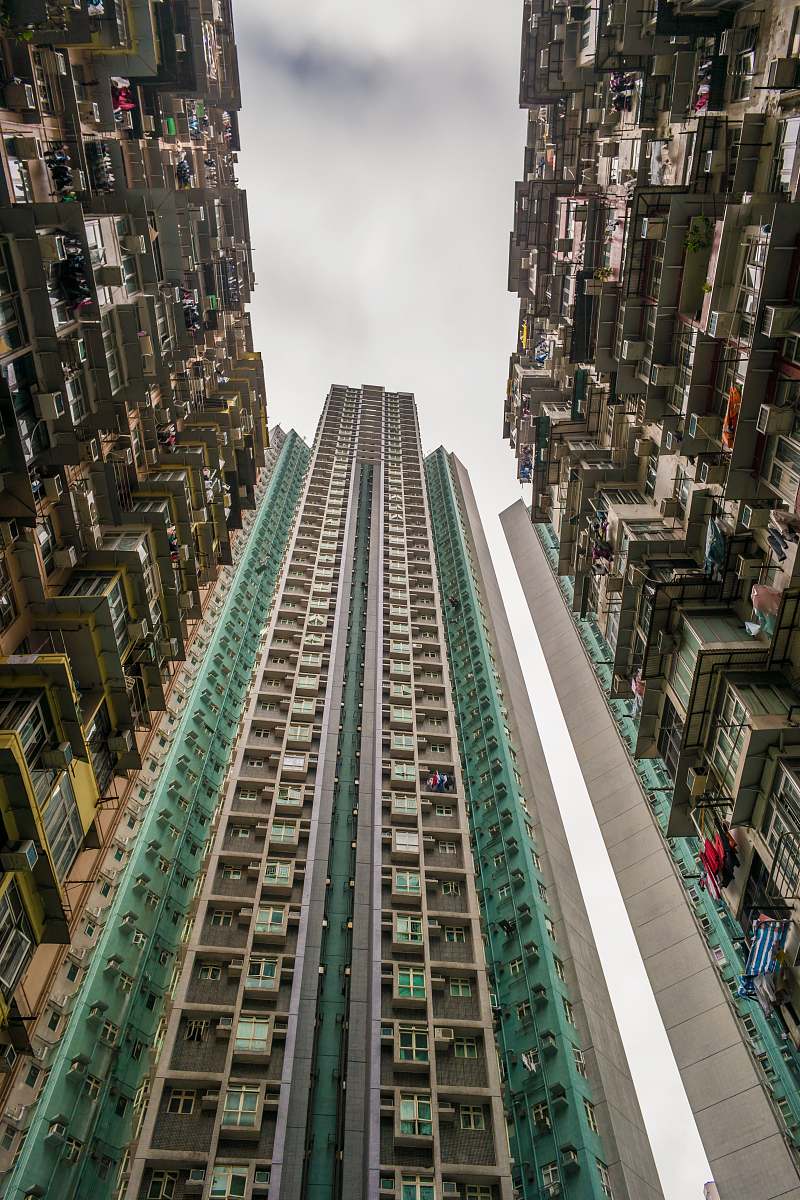 building low-angle photography of green and white concrete building during daytime high rise
