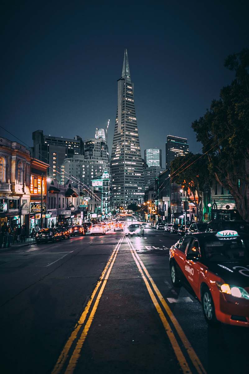 urban low-angle photography of road on city skyscraper