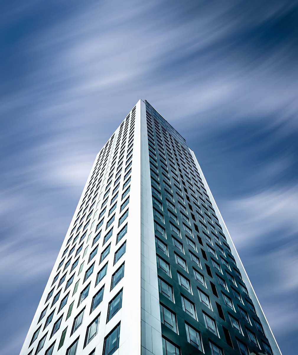 building low angle photography of white building office building