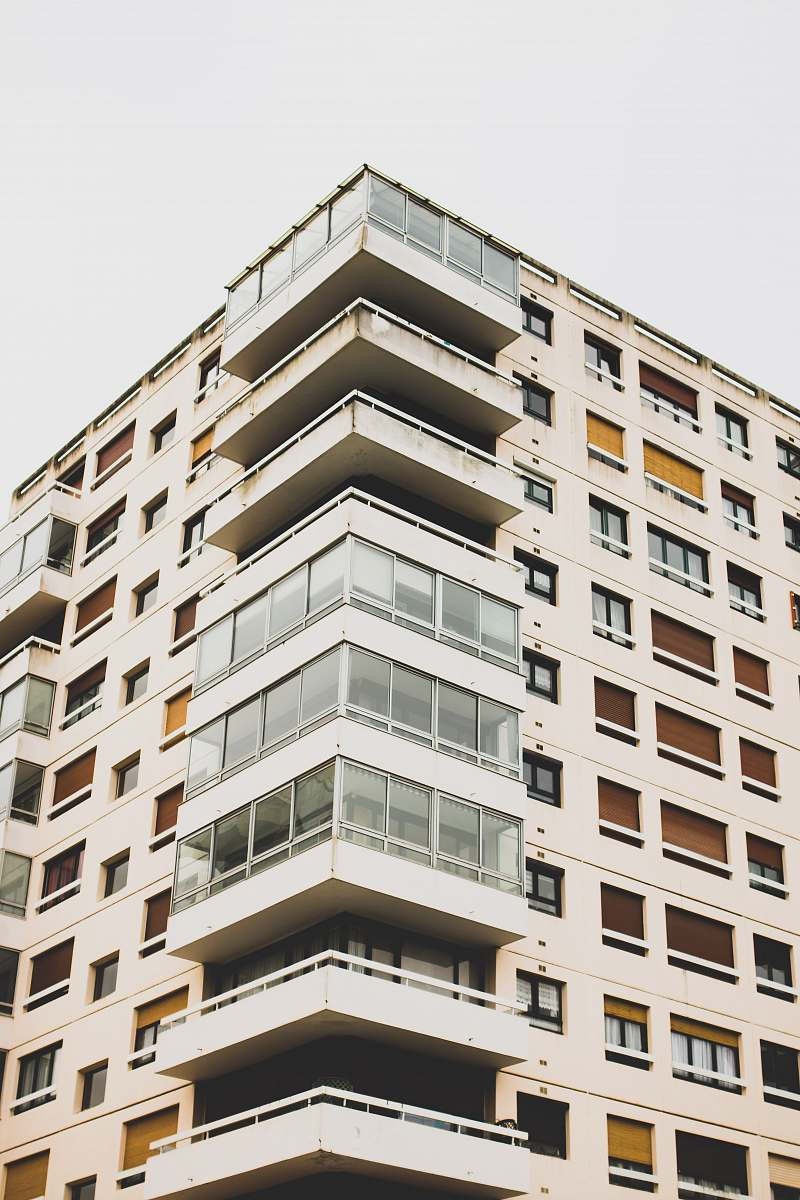 building low-angle view of white building high rise