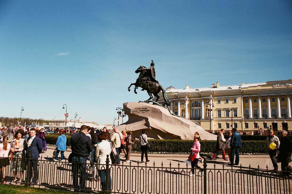 human people in park with man on horse statue person