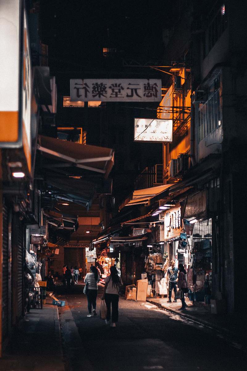 street people near buildings] road