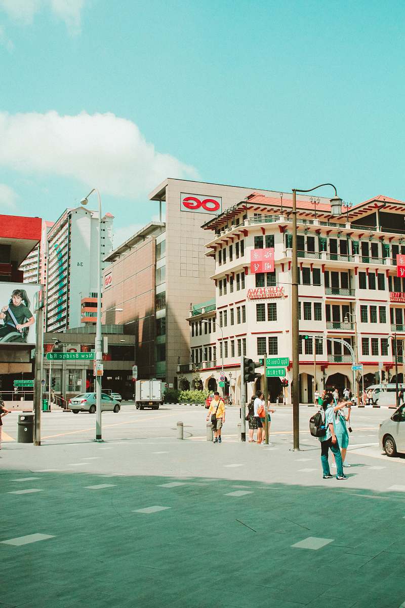 building people walking on street downtown
