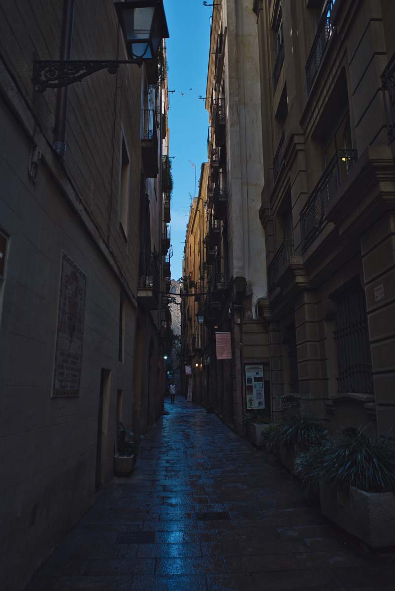 building person walking on alley urban
