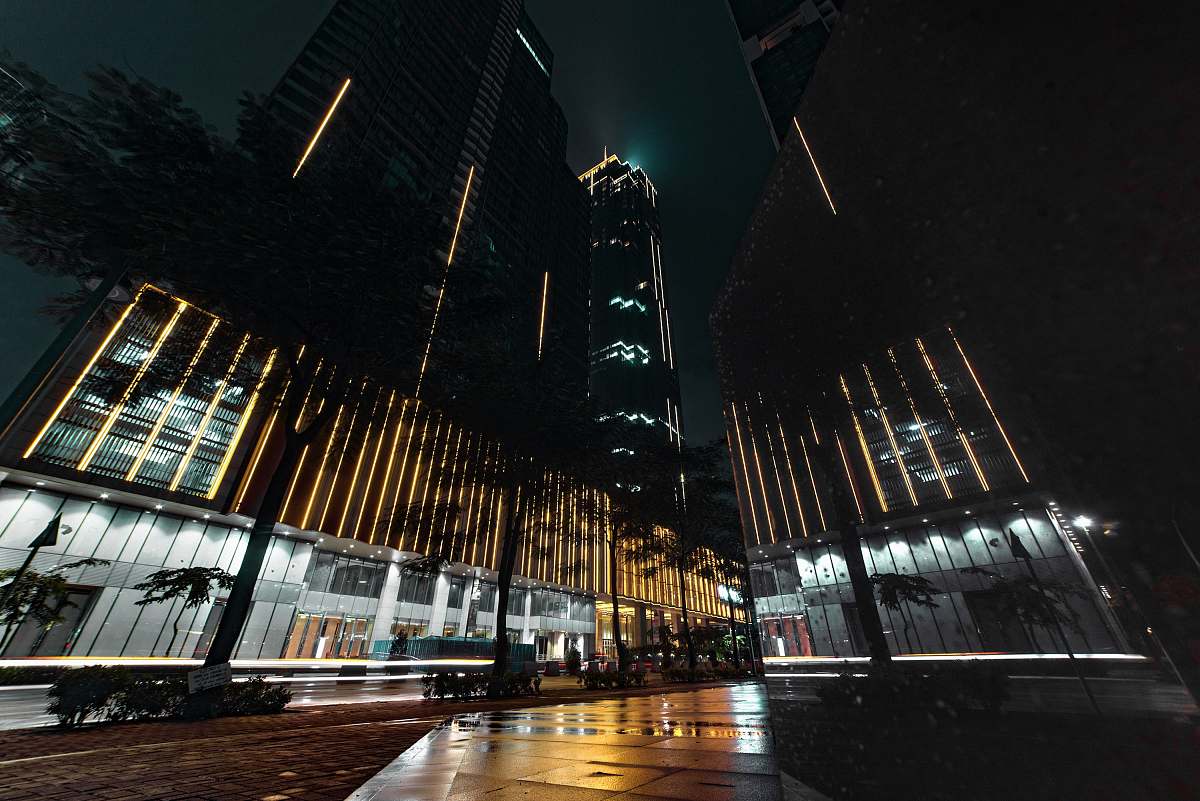 building photography of high-rise building during nighttime metropolis