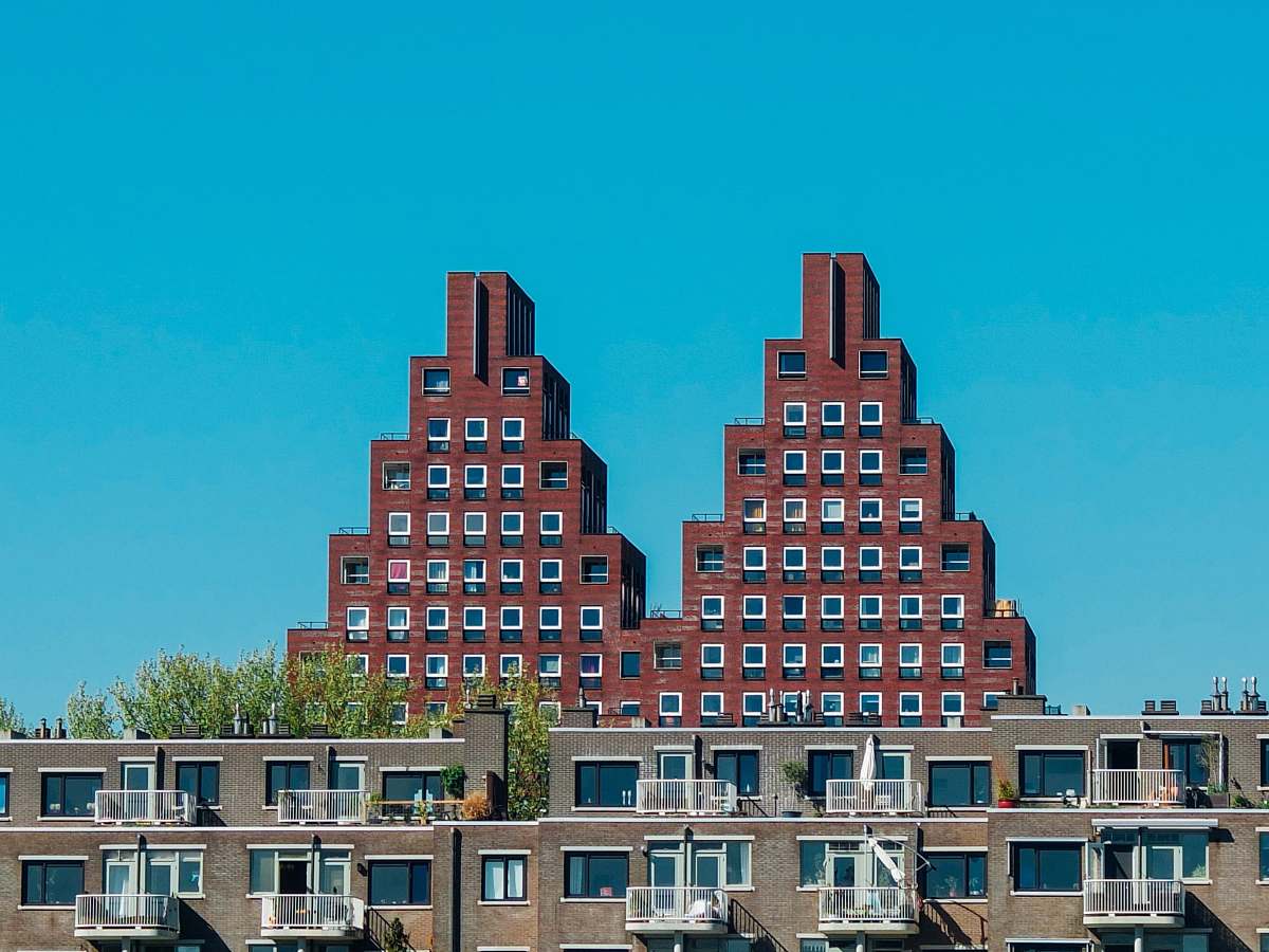 building red and brown building high rise