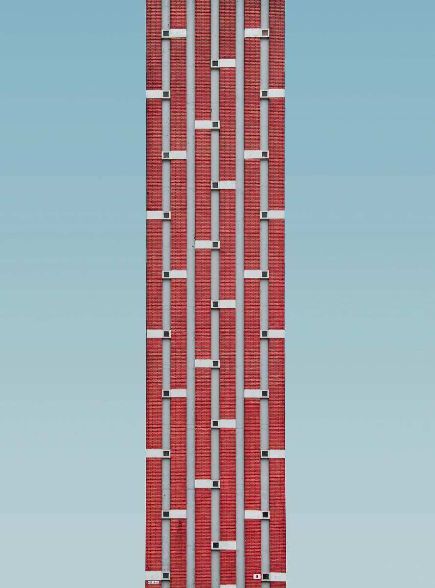 building red and grey metal gate urban
