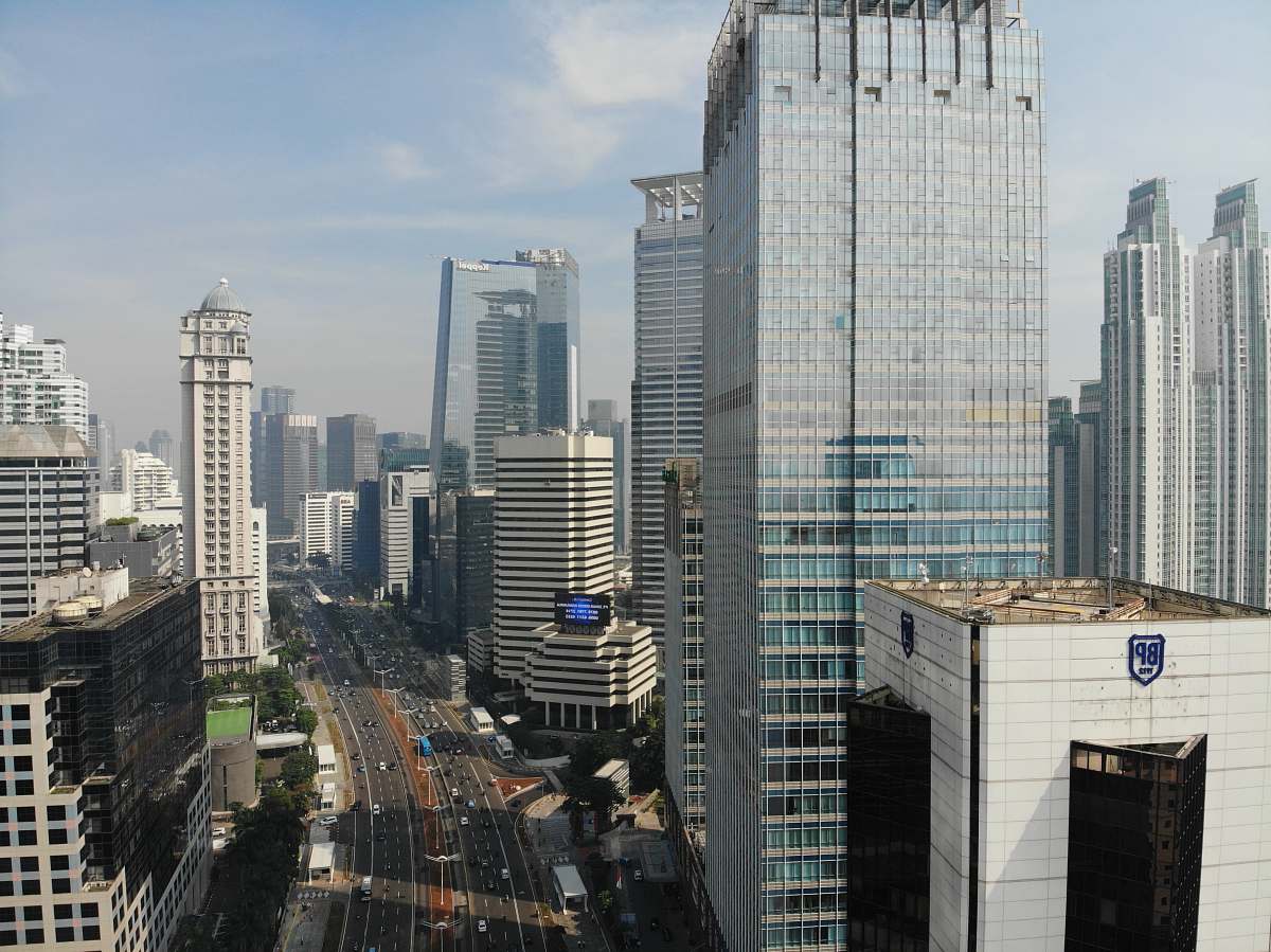 building road between buildings at daytime urban
