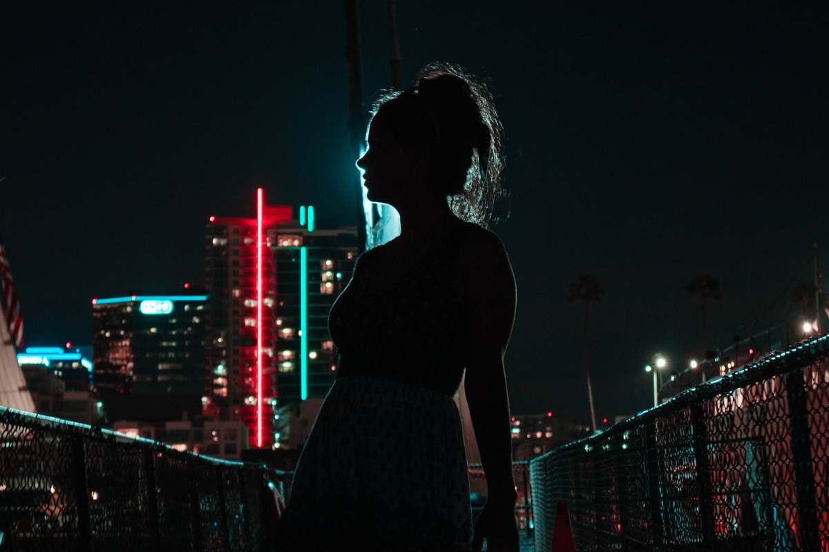building silhouette photography of woman urban
