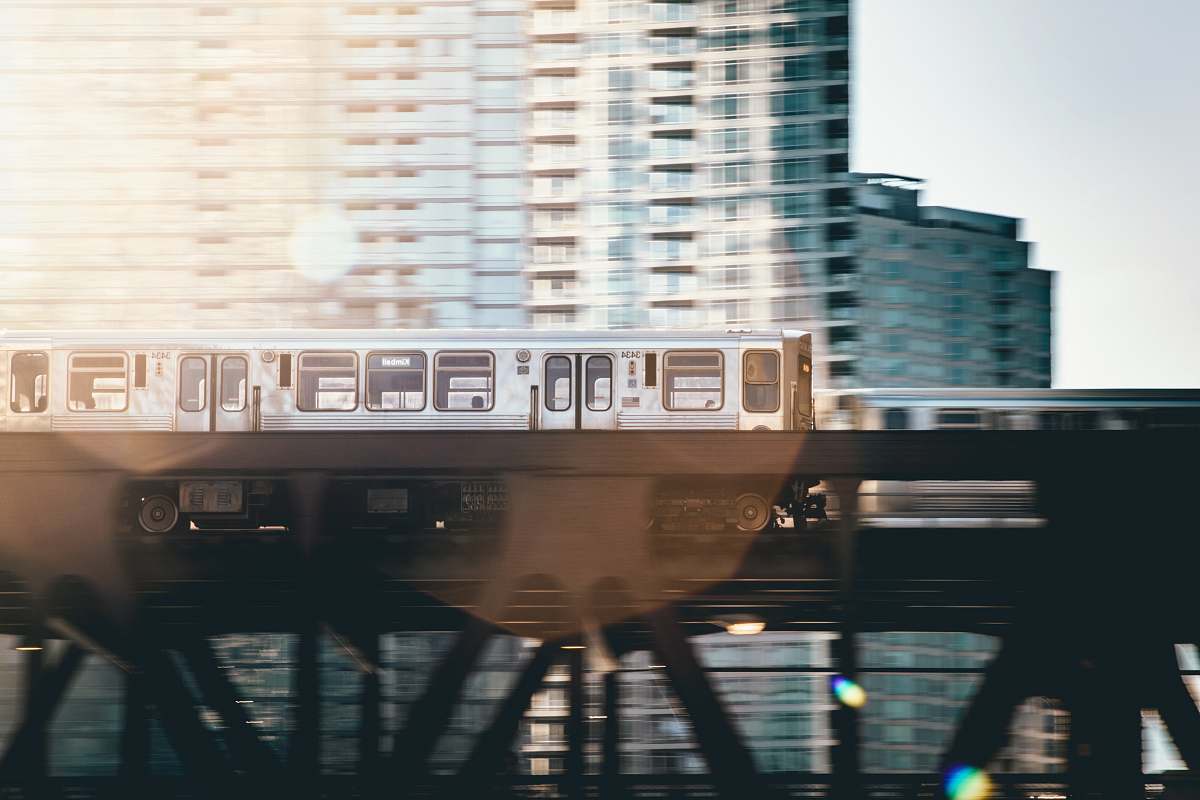 urban timelapse photography of passenger train chicago
