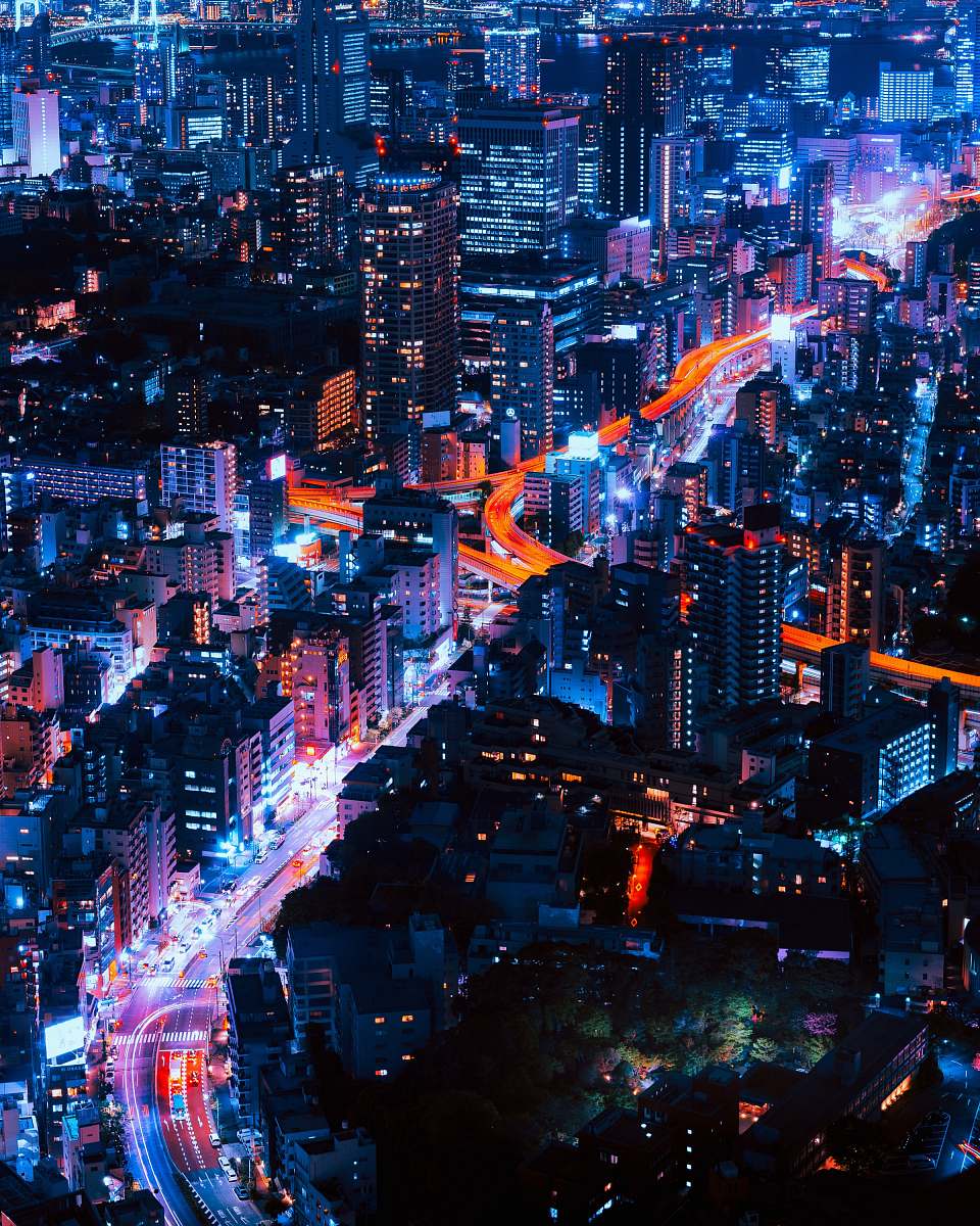urban timelapse photography of vehicles and buildings japan