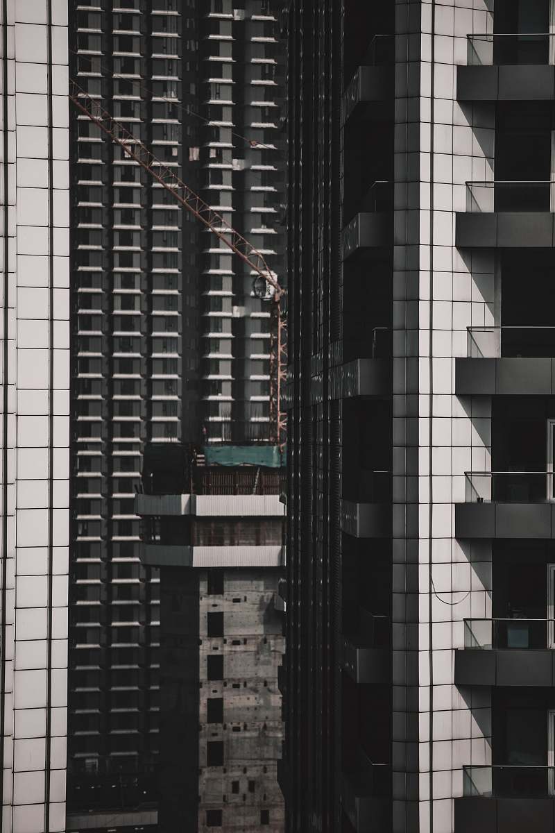 building white and black high-rise building high rise