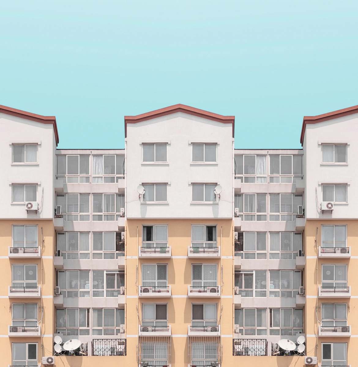 urban white and brown high-risebuilding town