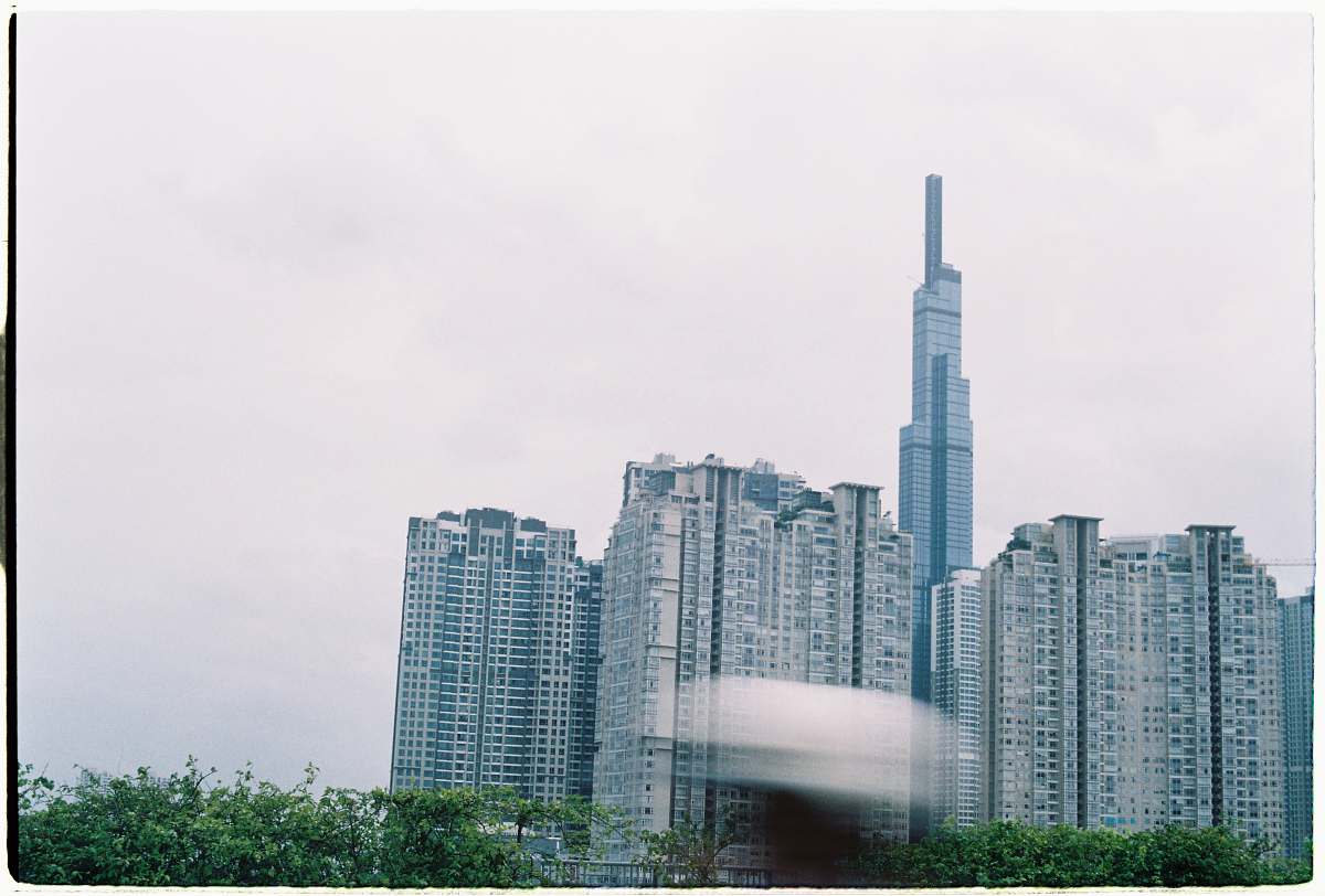 building white concrete high-rise building high rise
