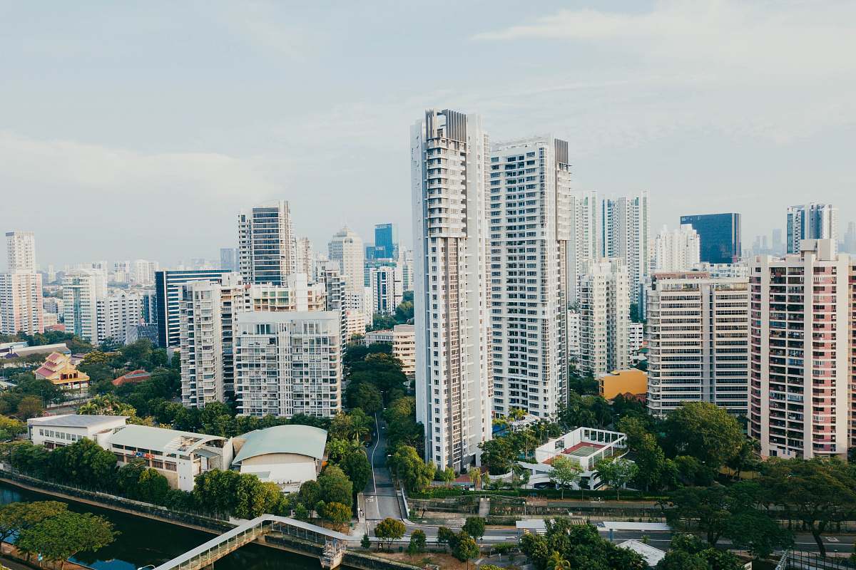 building white high-rise concrete buildings high rise