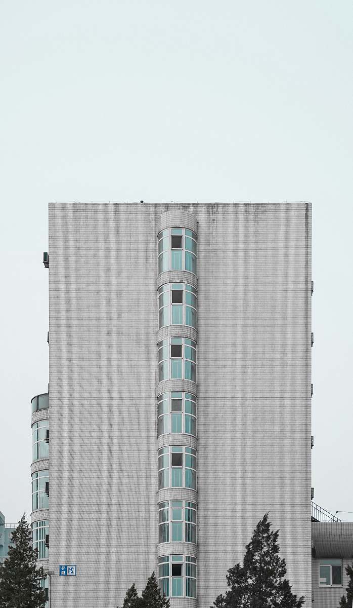 building white painted high rise building high rise
