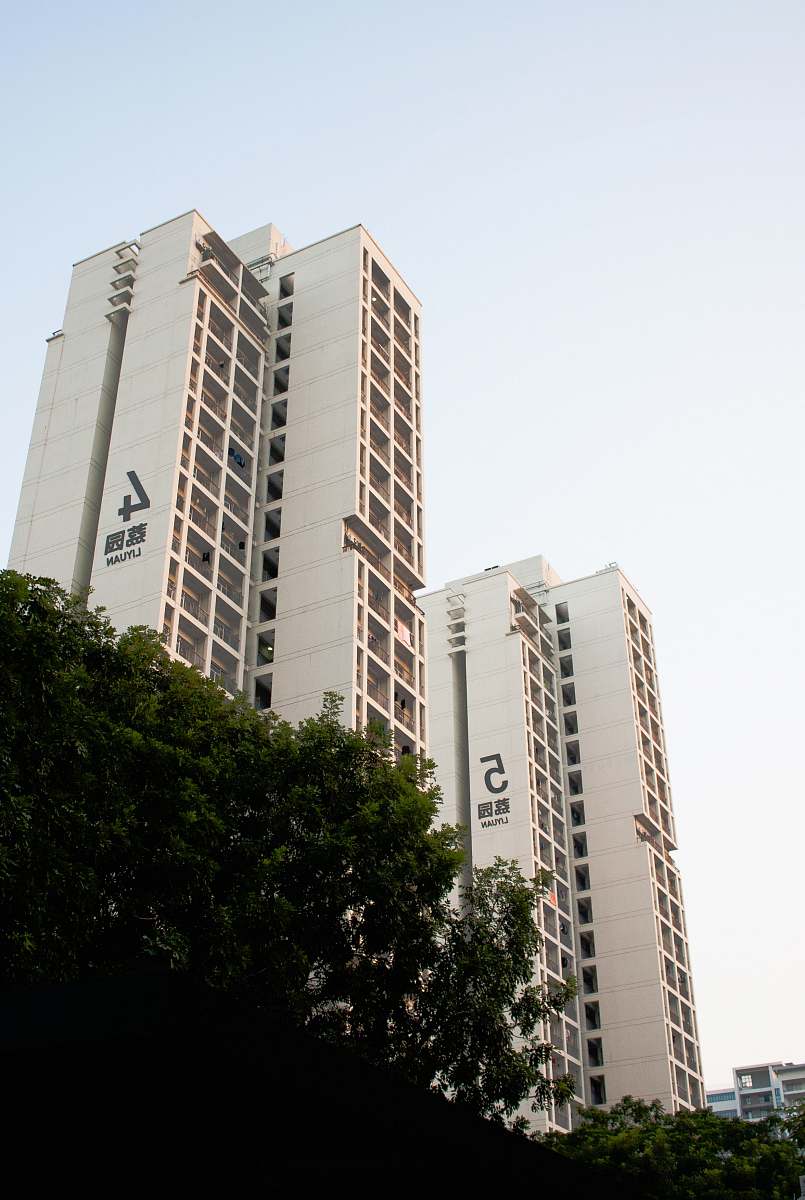 building worm view photo of white buildings high rise