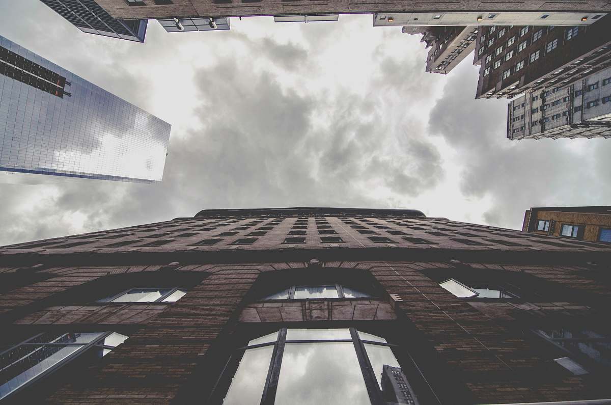 building worm's eye view of building grey