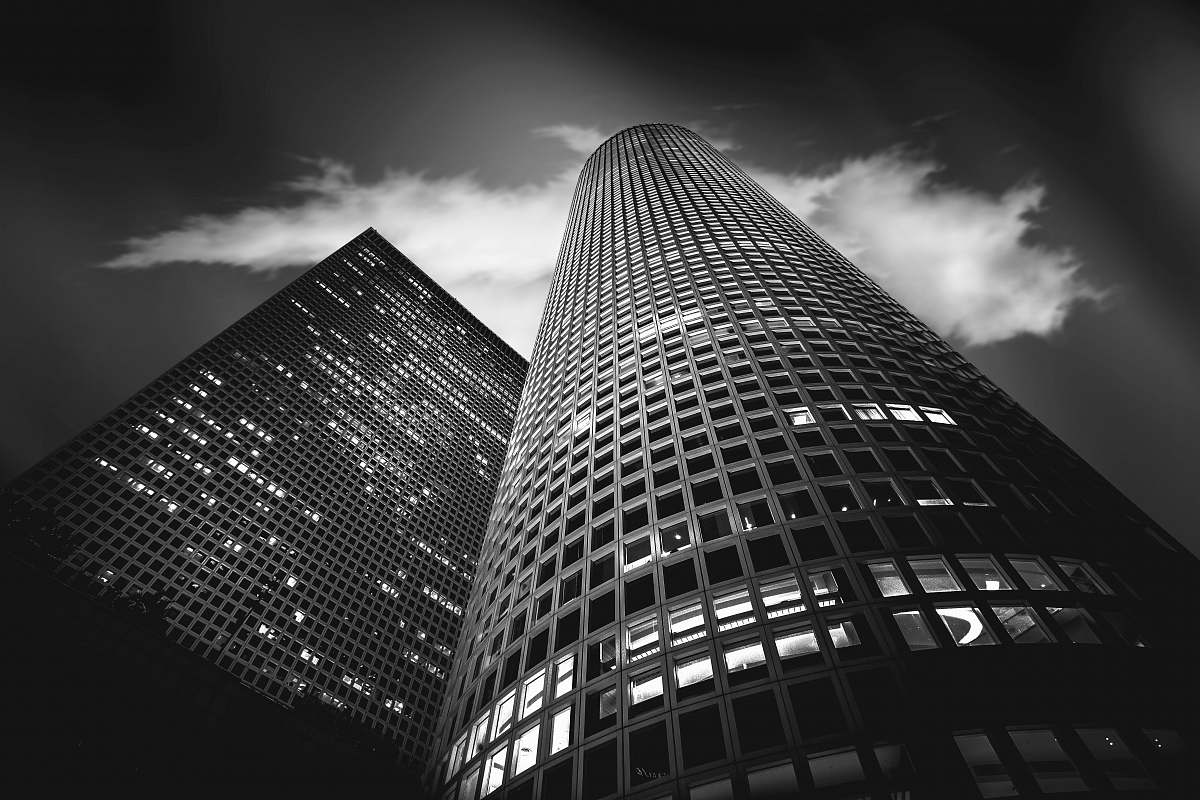 building worm's eye view of high-rise building black-and-white