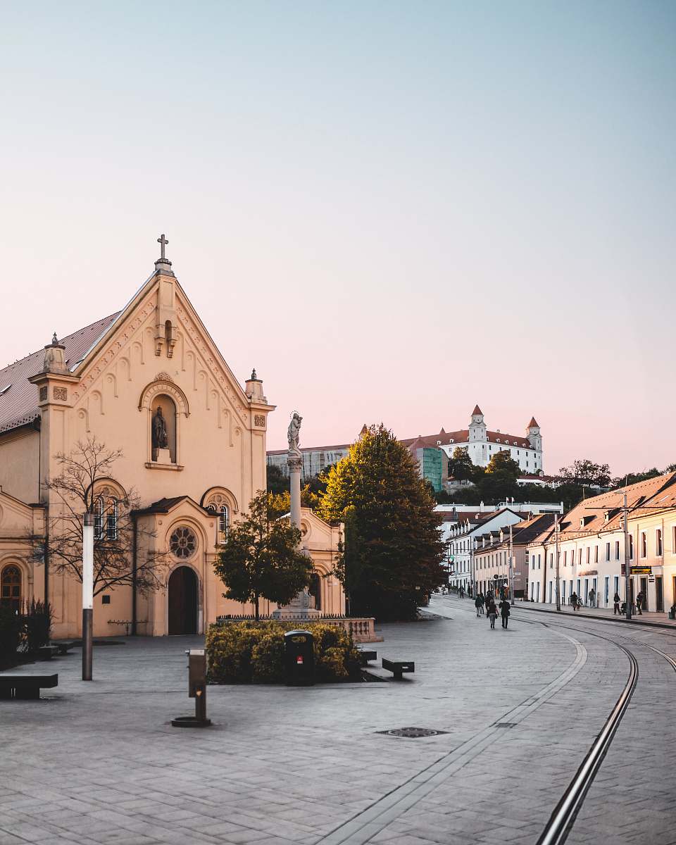 urban yellow cathedral during day time town