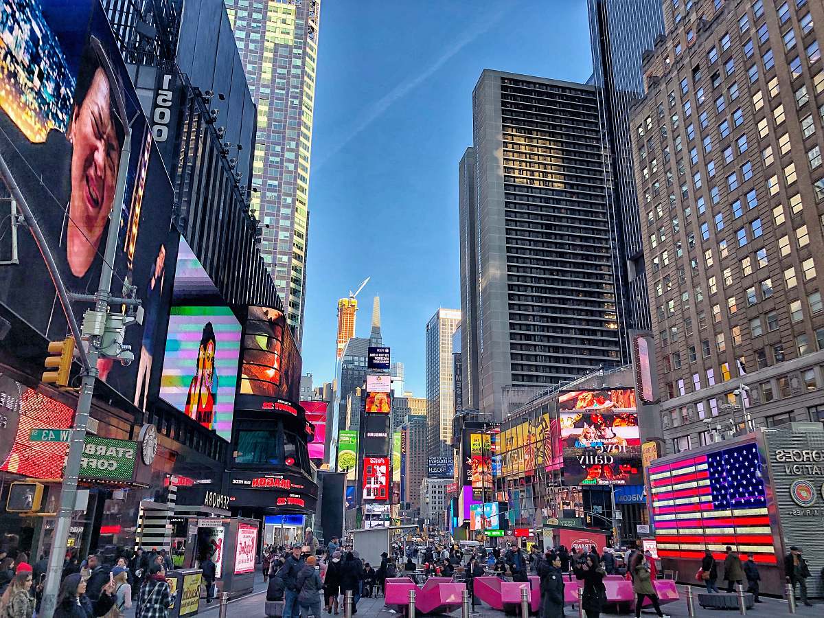 pedestrian New York buildings during daytime person