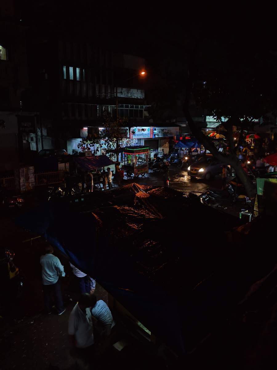 person people standing beside stores urban