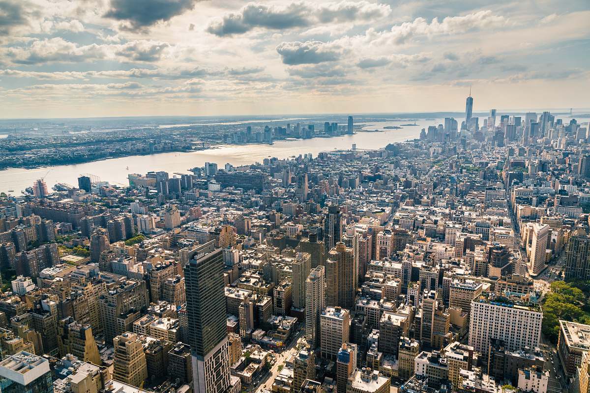 nature aerial view of buildings near body of water outdoors