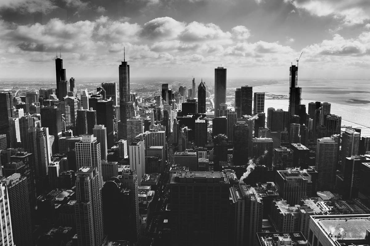 outdoors grayscale photography of high-rise buildigns black-and-white
