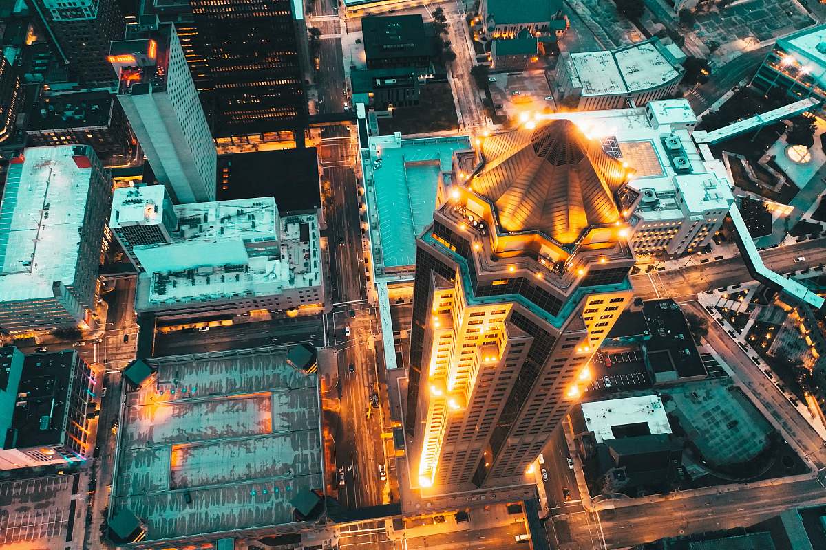 outdoors aerial photography of city with high-rise buildings at night time scenery