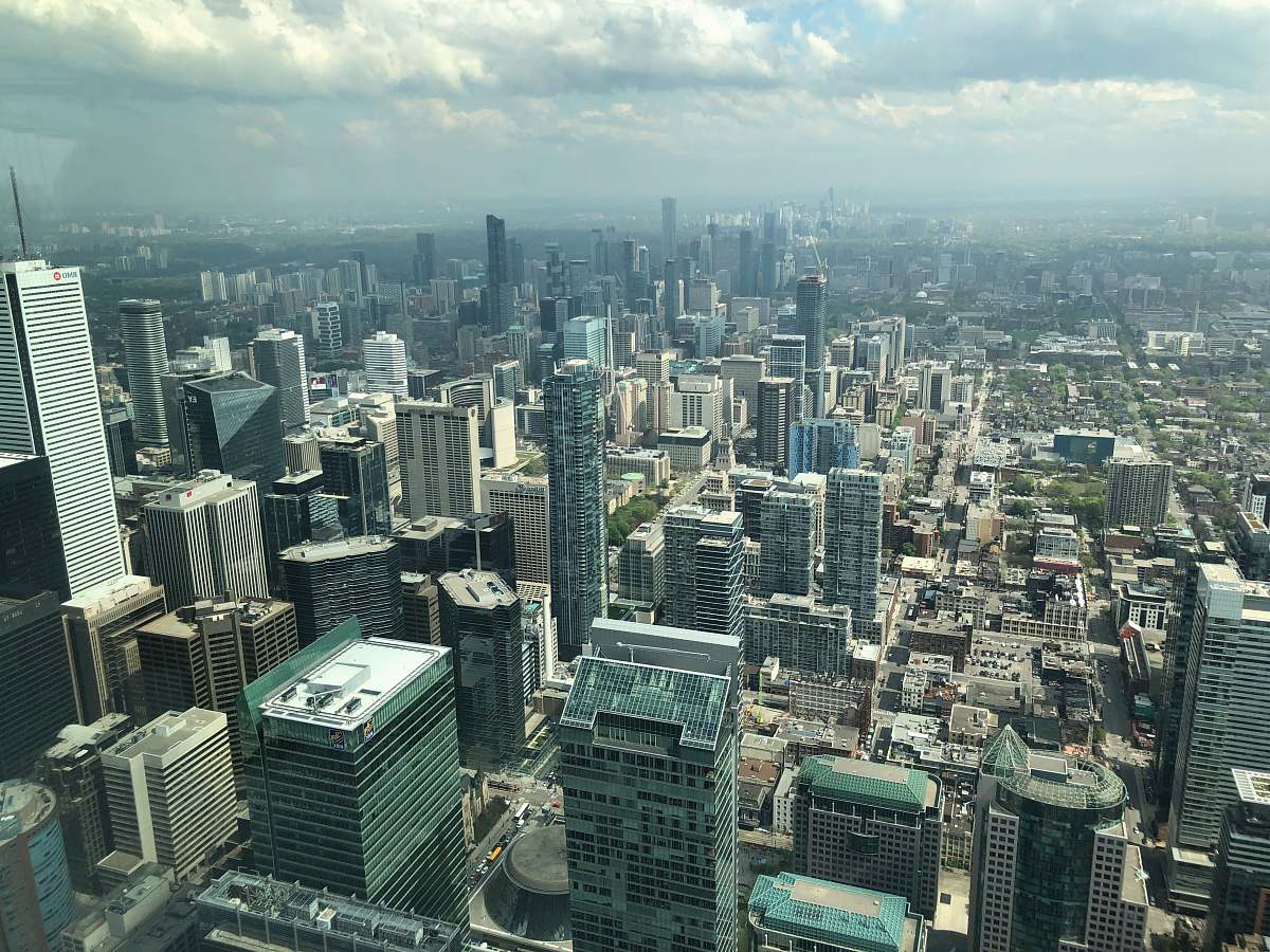 outdoors gray, green, and black high buildings at daytime scenery
