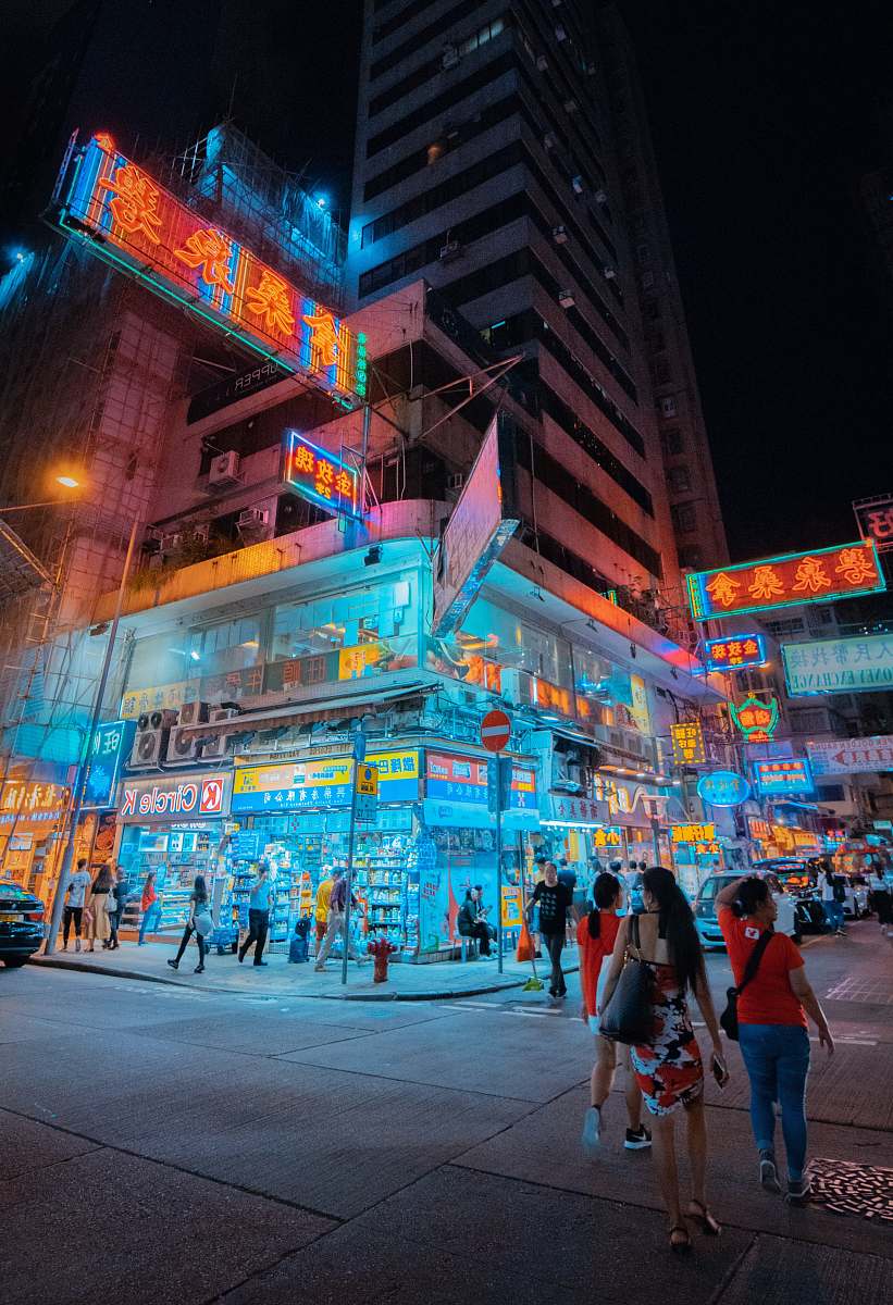 pedestrian people walking on street during night human