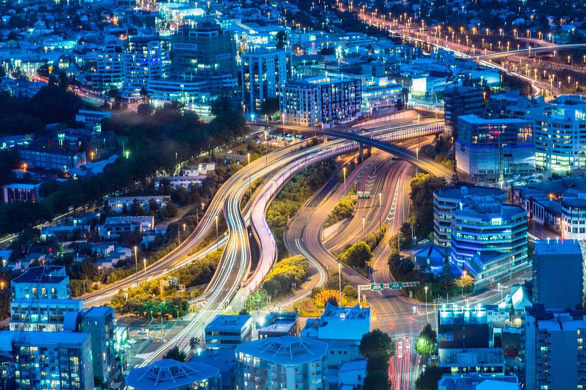 metropolis aerial photo of lighted city buildings during nighttime town