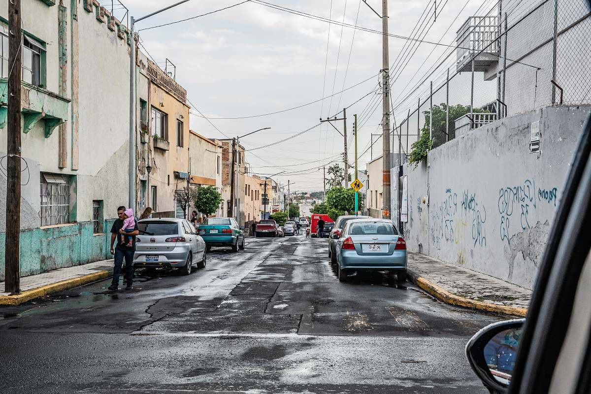 urban parked cars on street at daytime street
