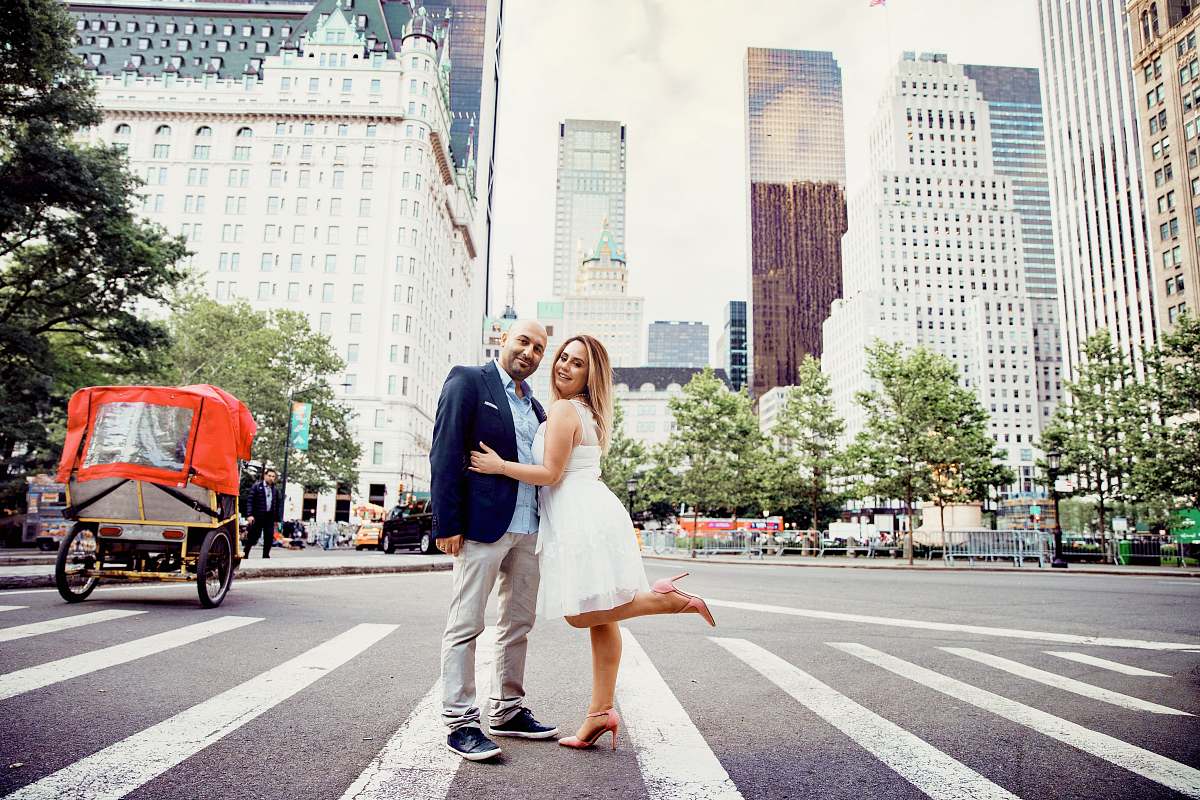 asphalt woman and man standing on pedestrian lane tarmac