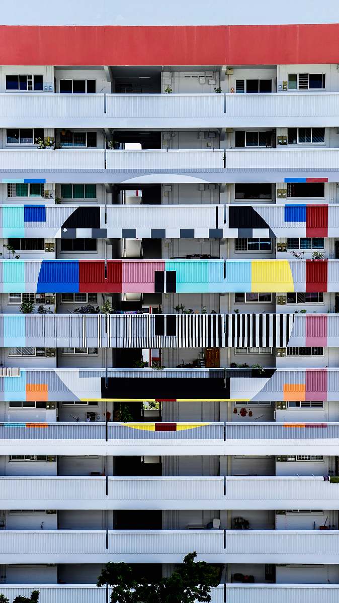 building multicolored multiple story building urban