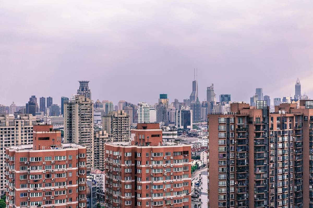 city brown and white buildings building