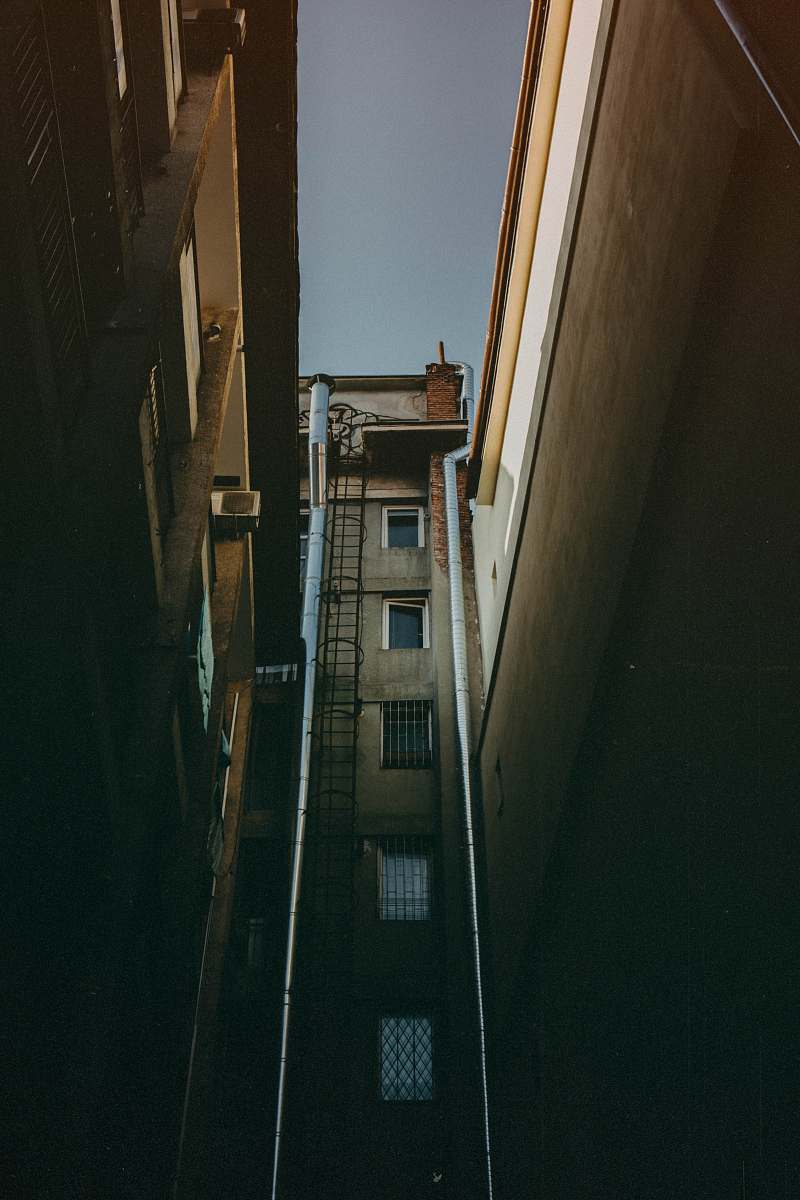 road brown concrete building town