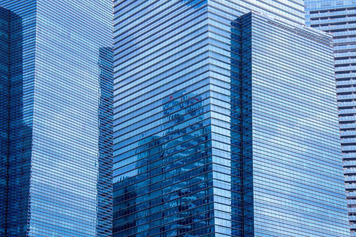 building curtain wall building during daytime city