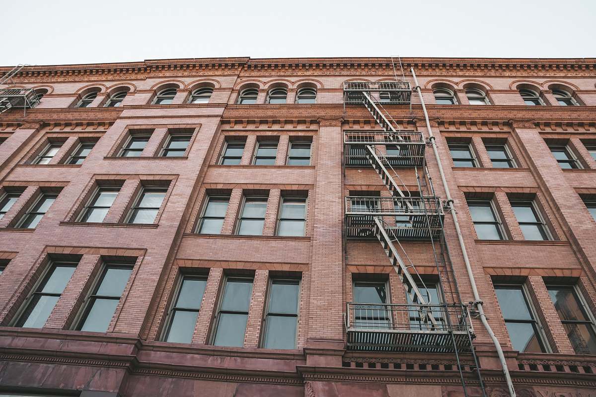 city high-angle photography of mid-rise building during daytime building