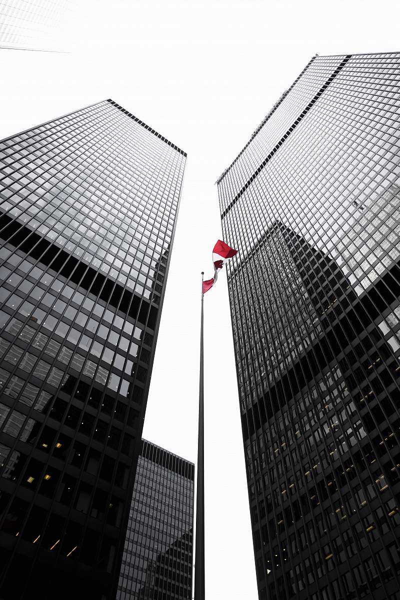 building low angle photography of high rise towers architecture