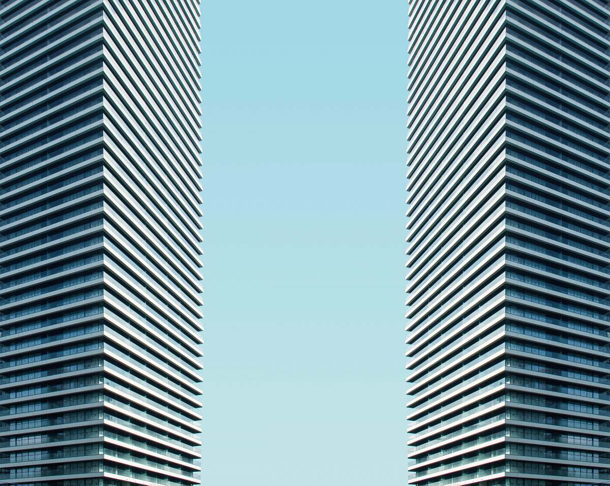 building two tall building during daytime city