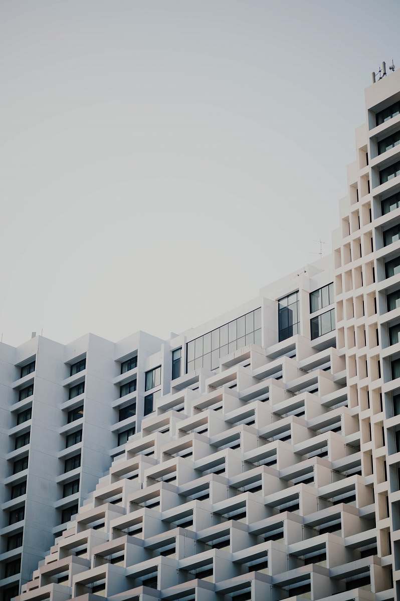building white concrete building high rise